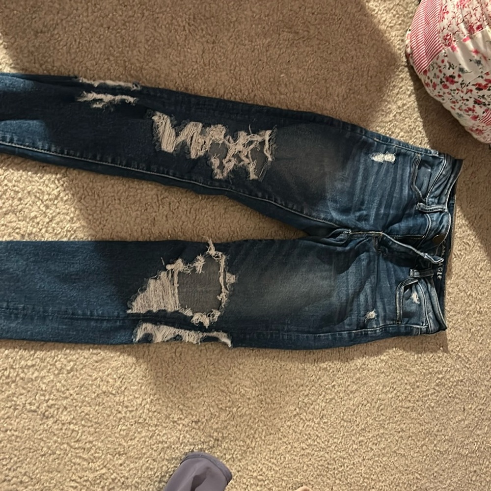american eagle dark ripped jeans.